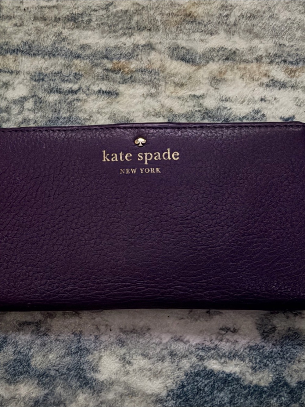 kate spade plum leather zip-around wallet with gold logo